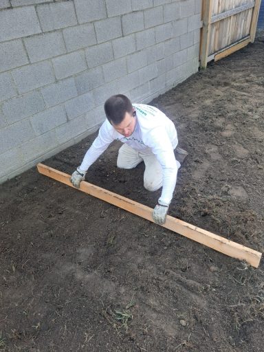 leveling out the ground for grass installation